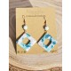 Boucles d'oreilles pendantes boho chic noir et or