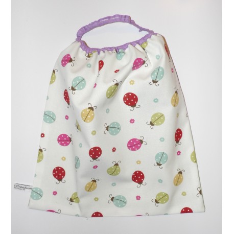 Serviette élastiquée de table "Coccinelles multicolores"